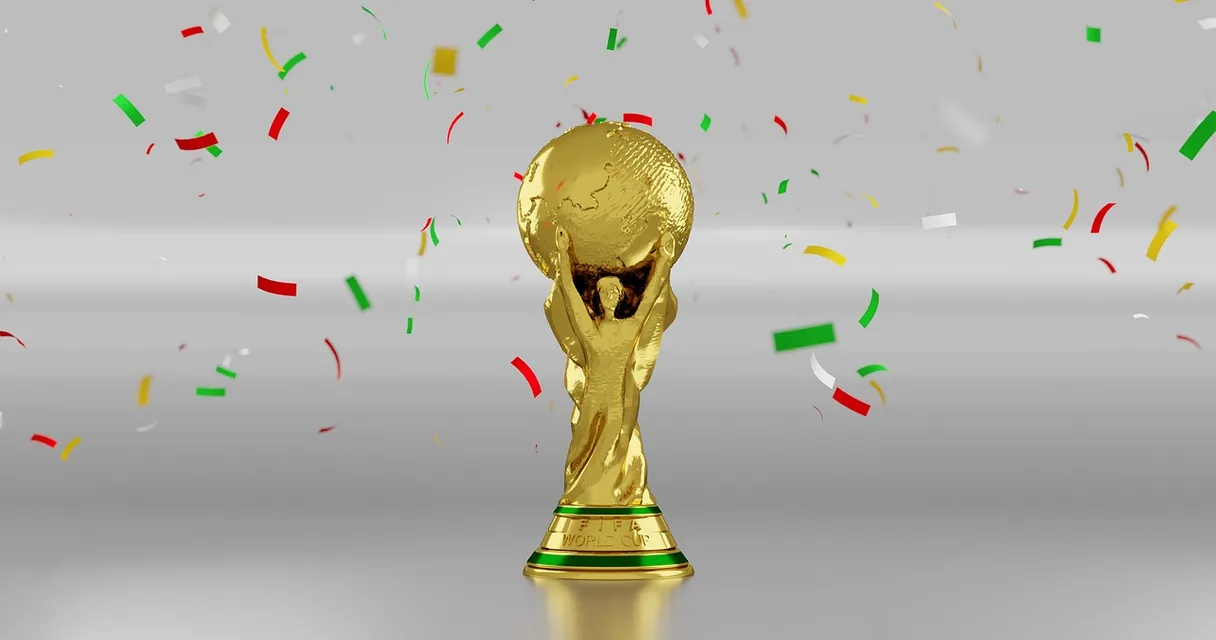 Taça dourada de campeão com confete ao redor, ilustrando como funciona a classificação da Copa do Mundo